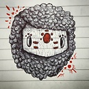 wooden mask with curly hair with red patterns drawing