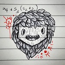 wooden mask with leaves for hair and red patterns drawing